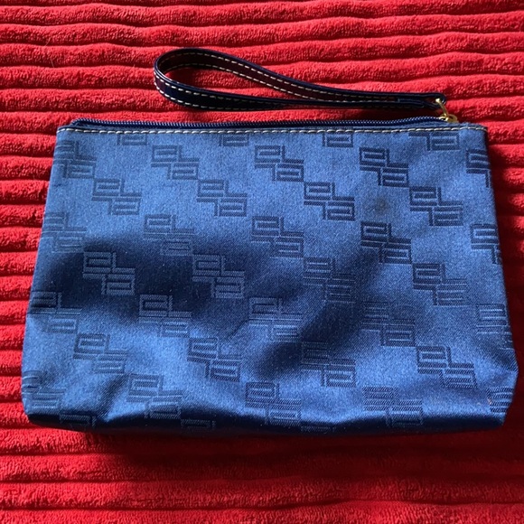 Navy blue zip top with wristlet handle - Picture 2 of 3